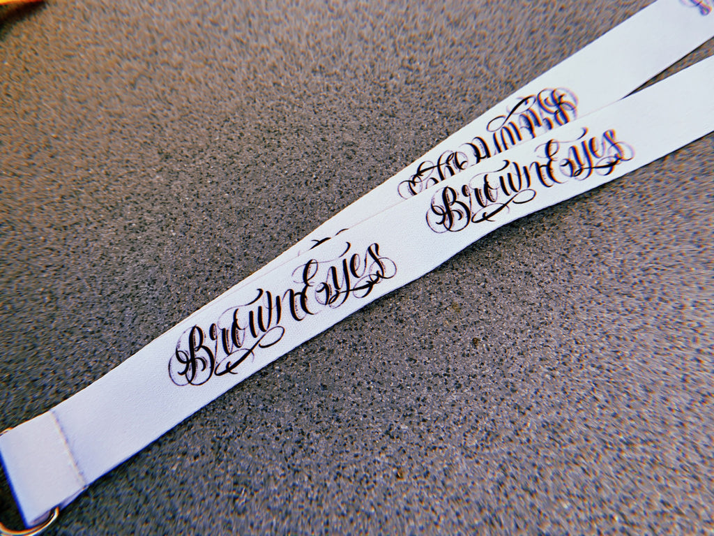 Brown Eyes Script Lanyard (Light Grey)