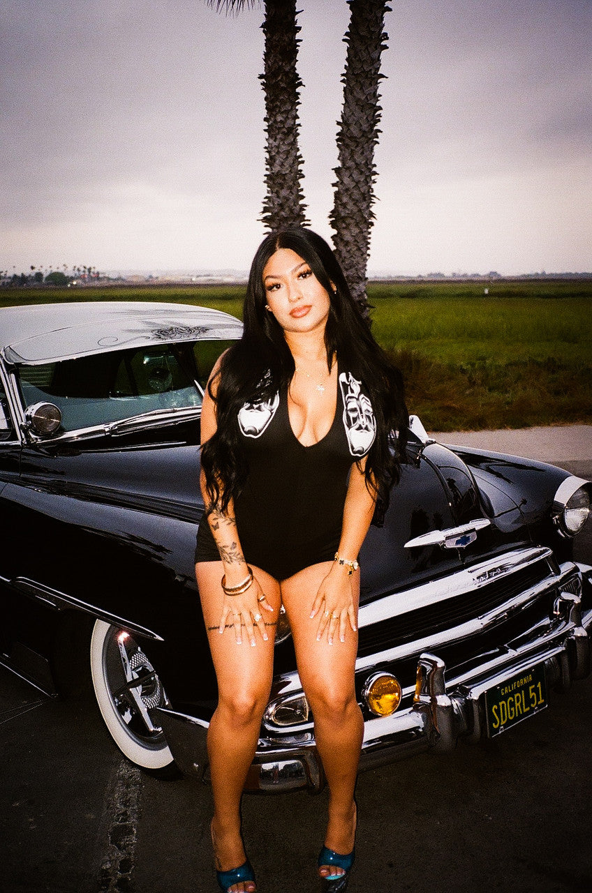 LIMITED EDITION 'SMILE NOW SMILE LATER' PEN & INK ONE PIECE DEEP CUT HALTER ROMPER (Black)